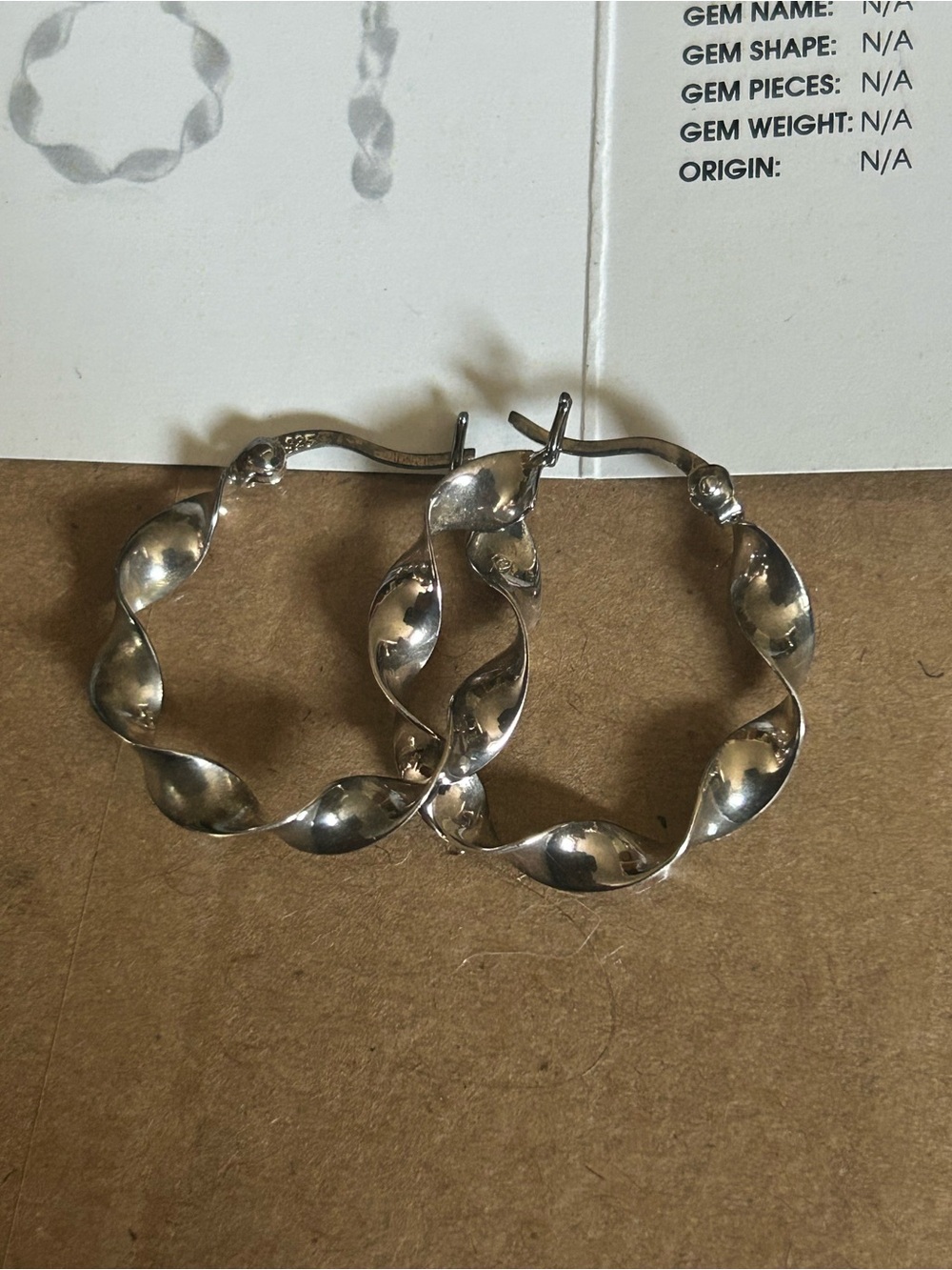 Sterling Silver Twisted Hoop Earrings - Silver